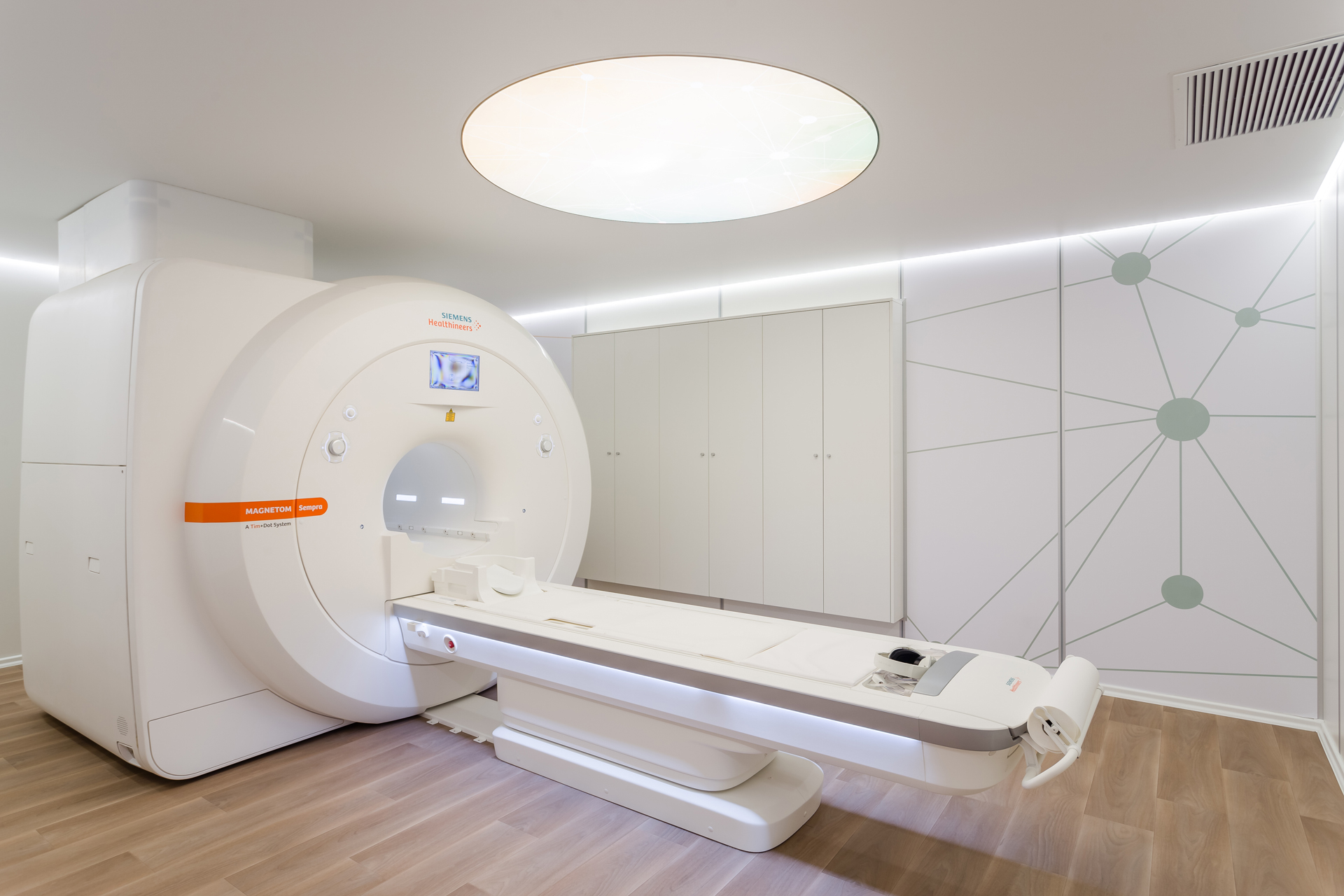 Emerald Medical Center health and fitness project by STIRIXIS Group showing MRI scanning room with clean white interior and medical equipment