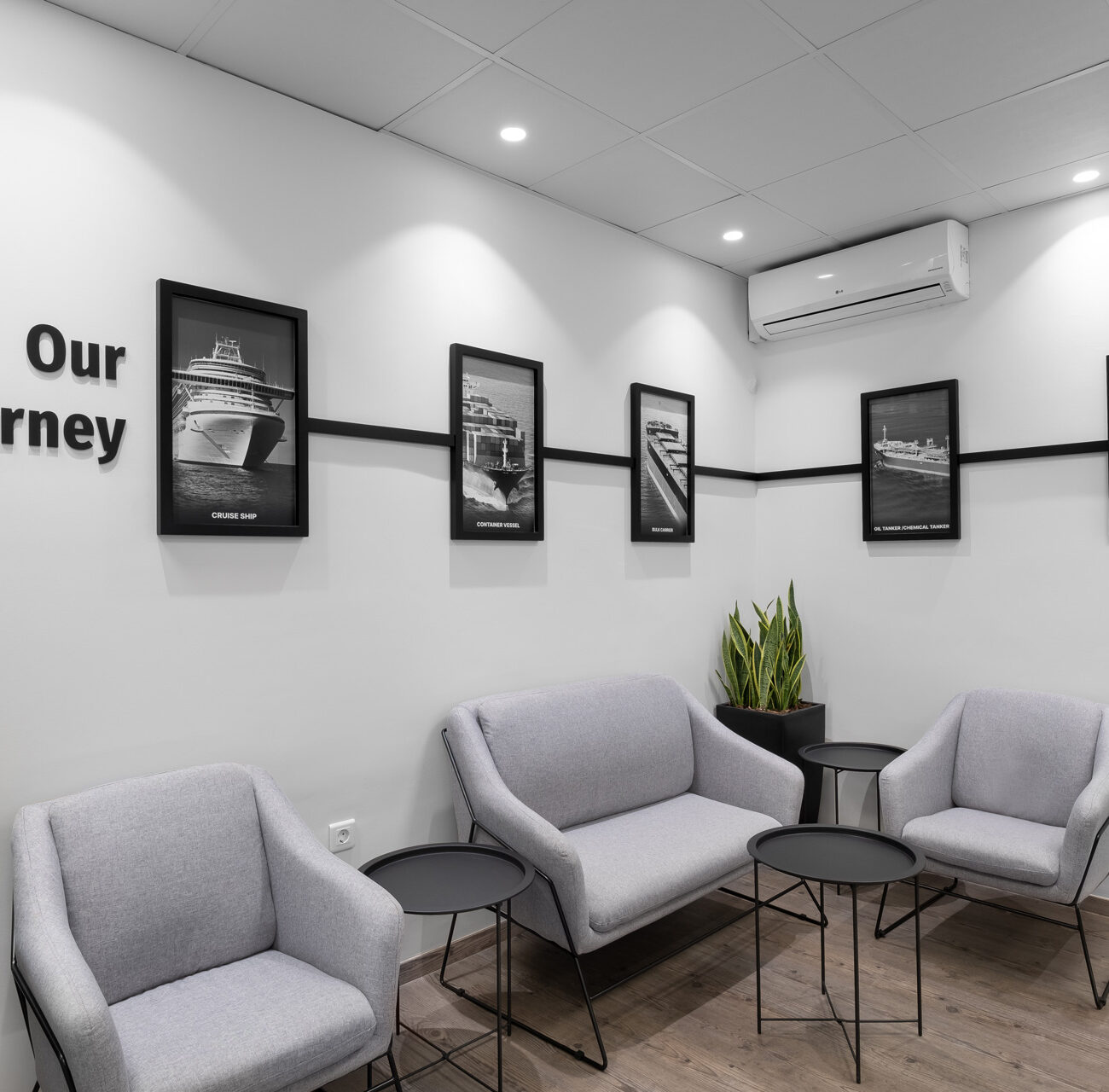 ALS Hellenic Maritime Training Center education project by STIRIXIS Group showing lounge area with our journey brand wall and soft seating
