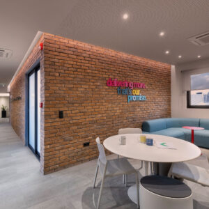 Future-ready workplace environment illustrating the human shift in work design and the STIRIXIS Group vision for adaptive workplaces by 2030