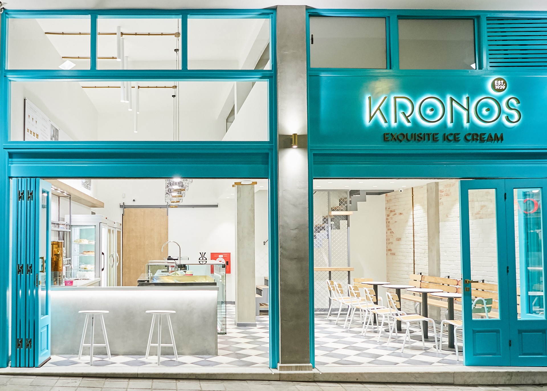 Kronos ice cream retail project by STIRIXIS Group showing full exterior facade with teal Kronos brand identity and glazed shopfront