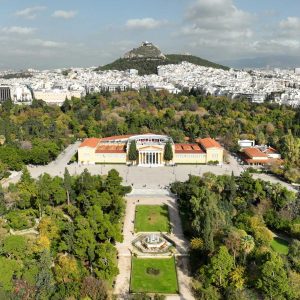 Aerial view of Zappeion and the National Garden in Athens, showing civic architecture, greenery and public space within the urban landscape.