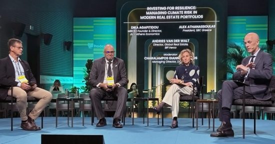 Four participants seated on stage during a Prodexpo 2026 discussion on climate resilience and real estate investment.